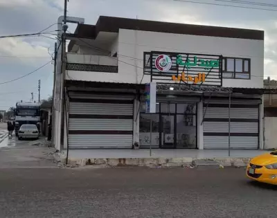 Corner commercial building for sale