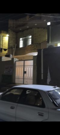 Two houses side-by-side, each with an area of 120 square meters.