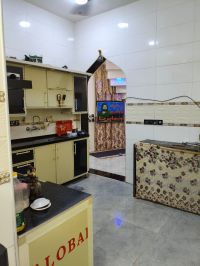 Two houses side-by-side, each with an area of 120 square meters.